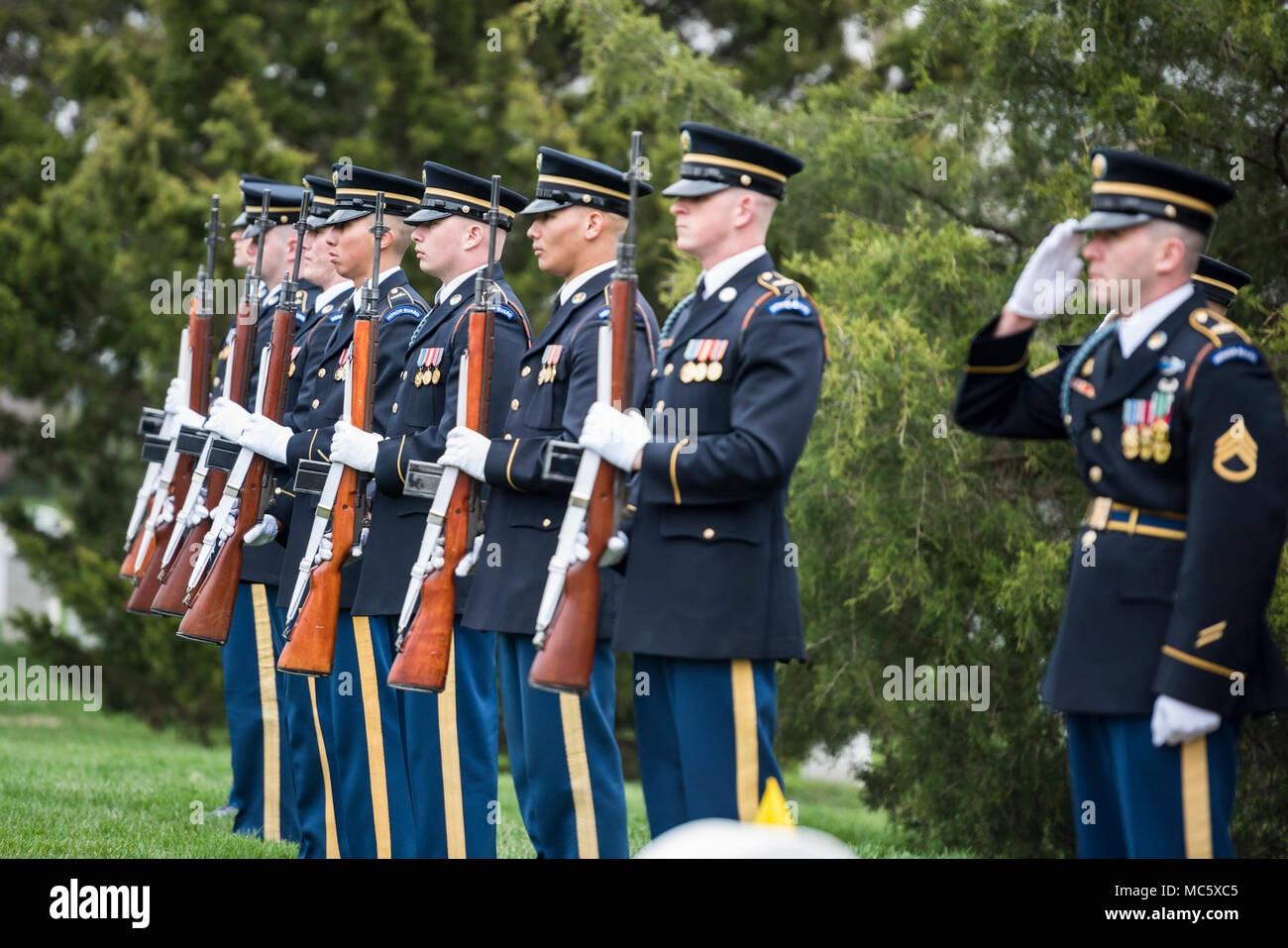 Members of the 3d U.S. Infantry Regiment (The Old Guard) firing party support the full honors funeral of U.S. Army Col. and Estonian Gen. Aleksander Einseln in Section 34 of Arlington National Cemetery, Arlington, Virginia, April 2, 2018.  Born in Estonia, Einseln immigrated to the United States in 1949 and enrolled in the U.S. Army in 1950 at the outbreak of the Korean War. He served with Special Forces in the Vietnam War and retiring as a Colonel in 1985. In 1993, Einseln returned to Estonia at the request of Estonian President Lennart Meri to serve as the first commander of the Estonian Def Stock Photo