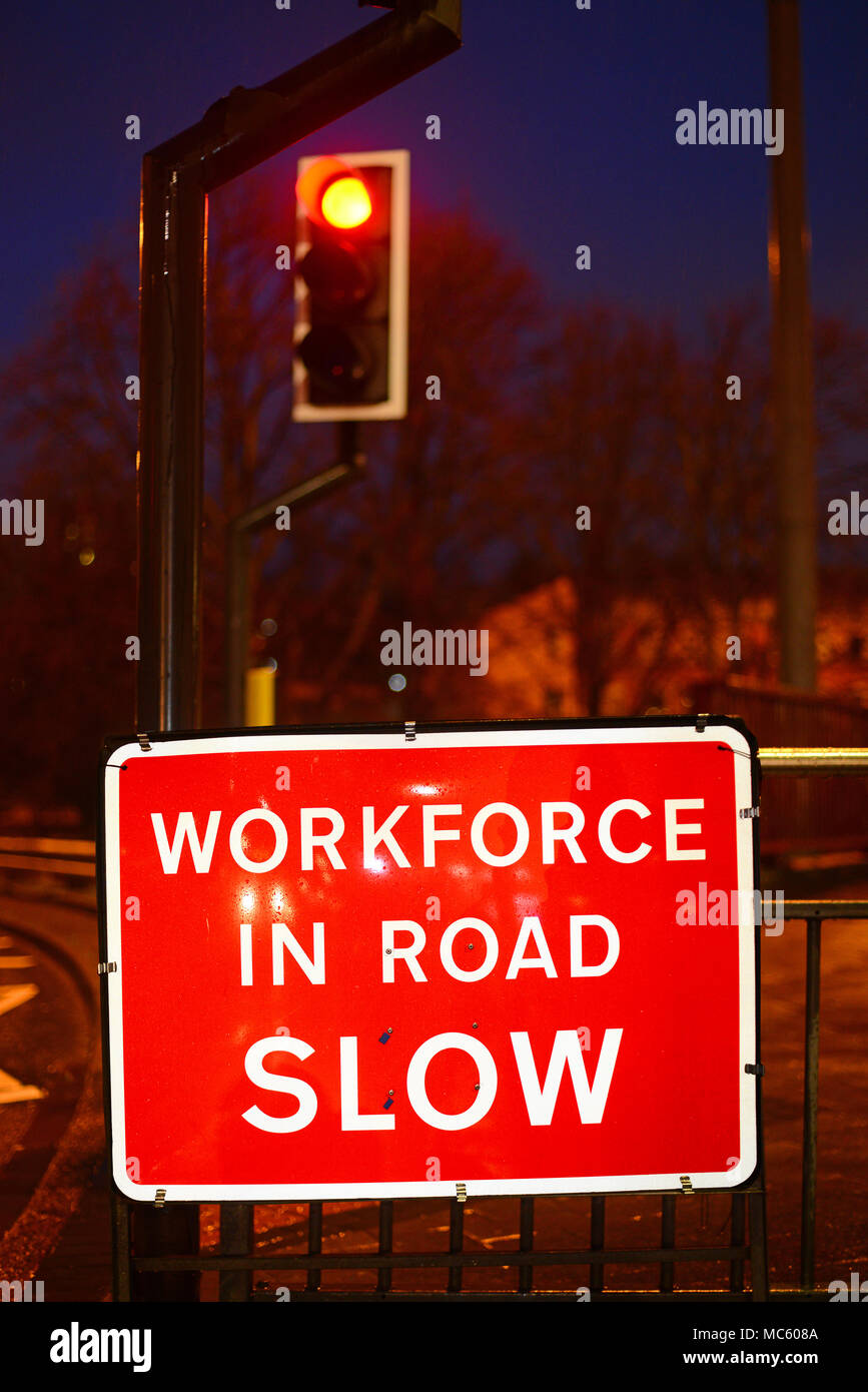 warning sign of workforce working in the road ahead leeds united kingdom Stock Photo