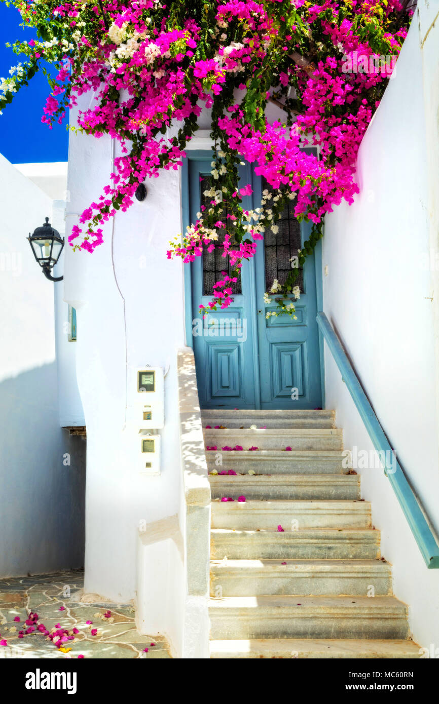 Old streets of Greece,view with floral decoration and old door,Naxos Stock Photo