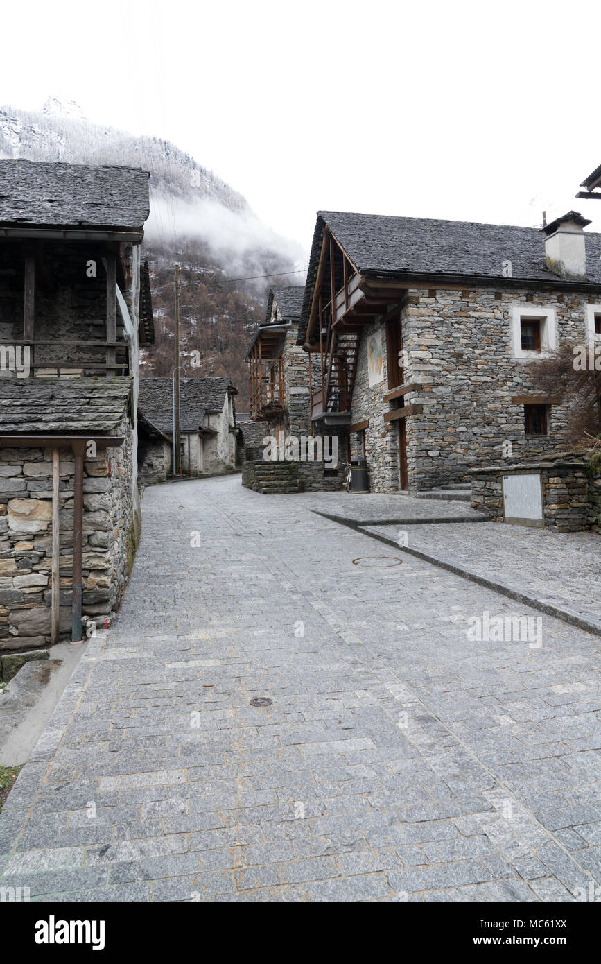 view of a rustic traditional mountain town in the Alps of southern Switzerland Stock Photo