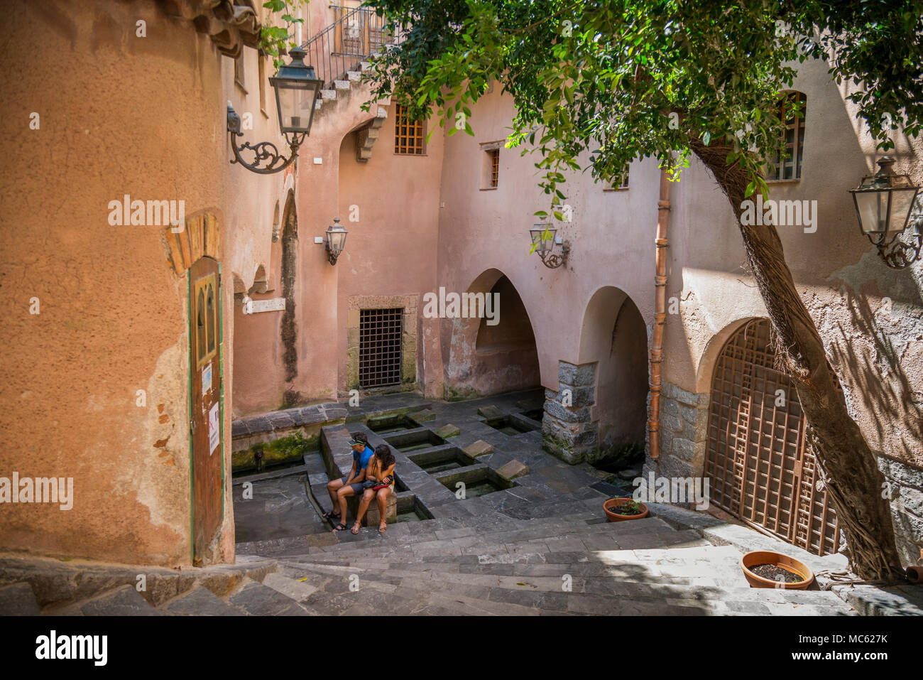 Lavatoio Medievale (Medieval wash house) in Cefalu, Sicily, Italy. Built in the 16th century and restored in 1991. Stock Photo