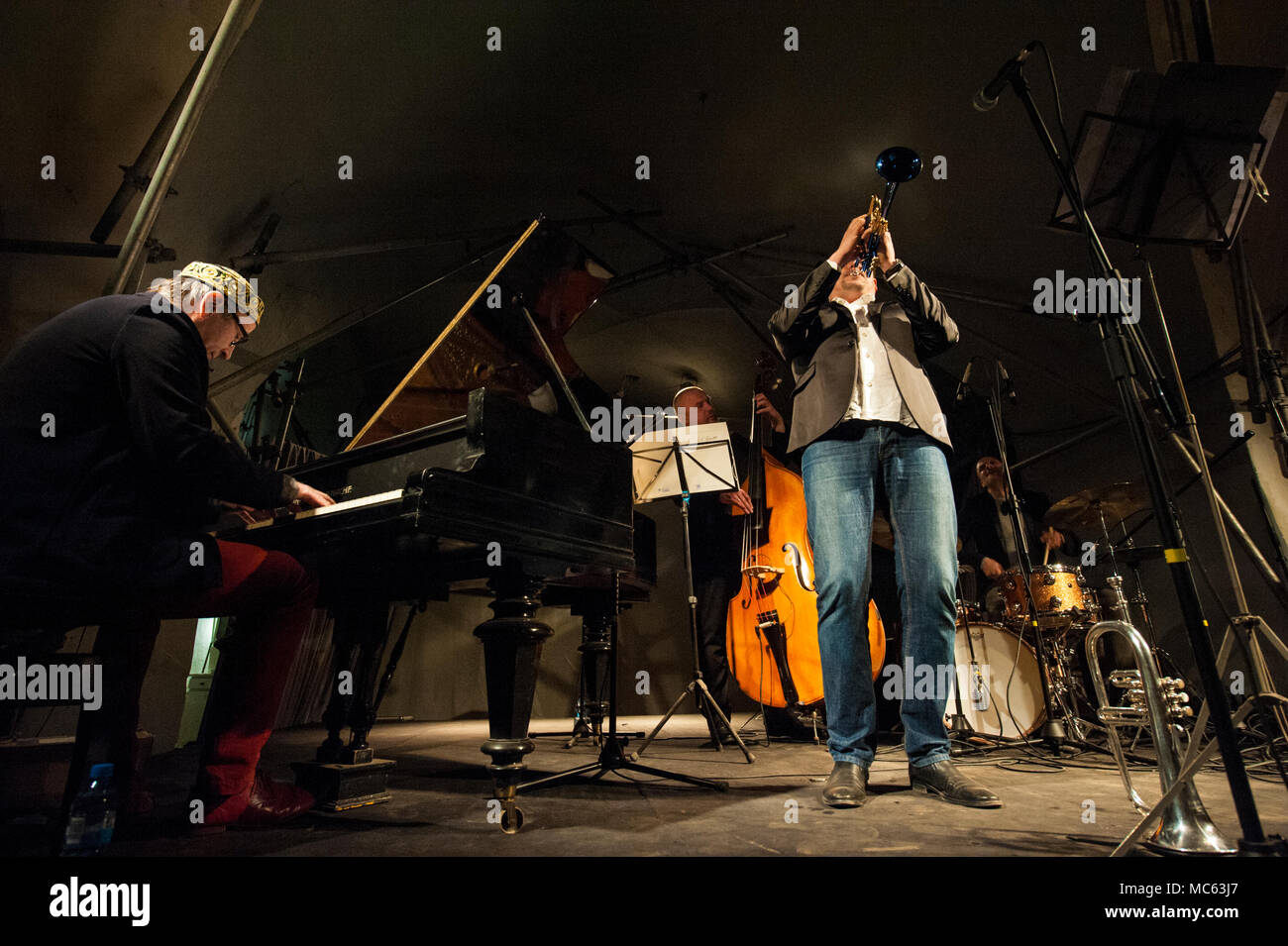 Leszek Kulakowski Quartet performing in the cellar vault of the Camaldolese Chruch in Warsaw, Bielany Forest. Warszawa, Poland. Stock Photo