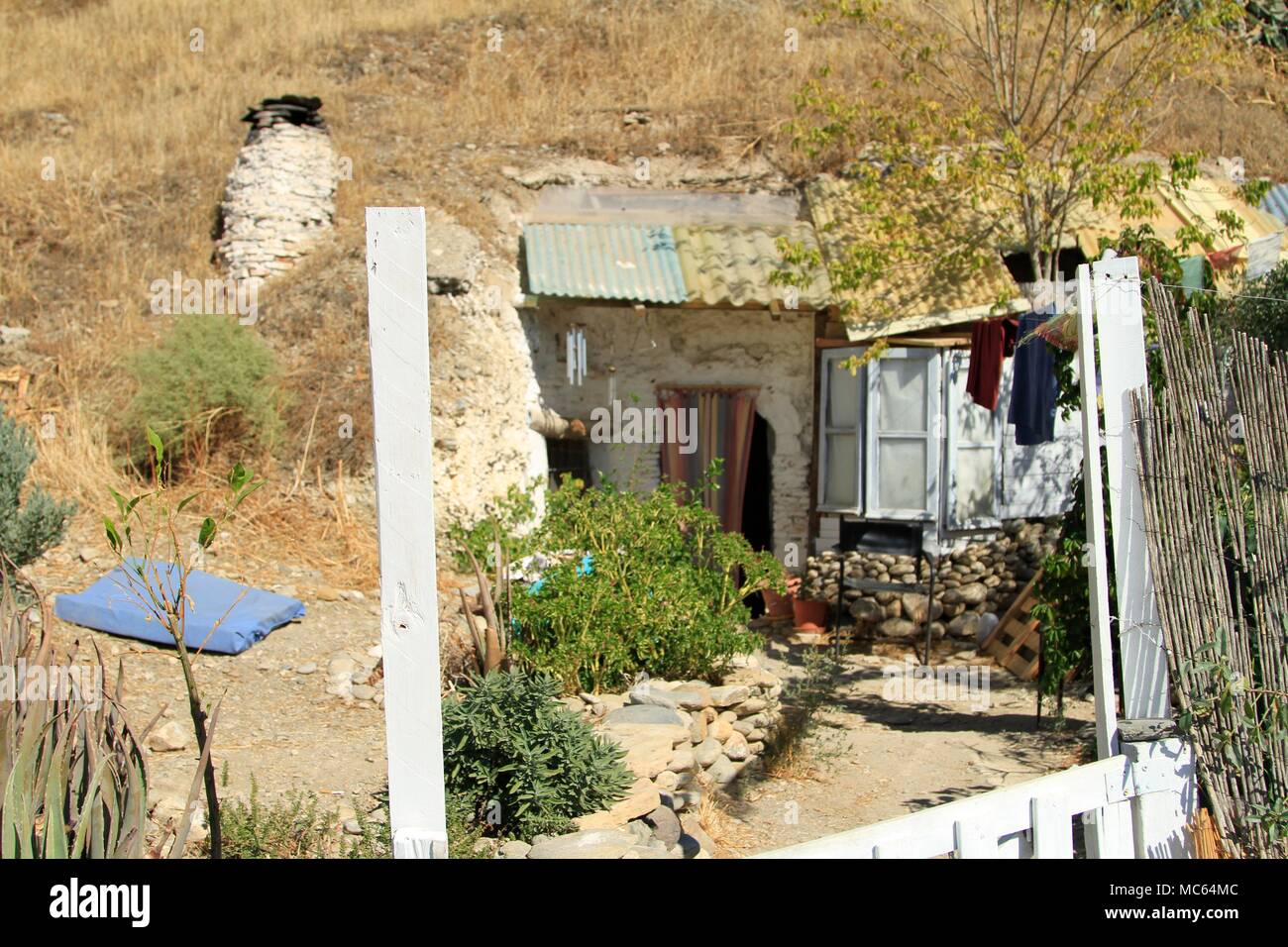 Entrance to a Cave House in the Sacromonte neighborhood of Granada, Spain Stock Photo