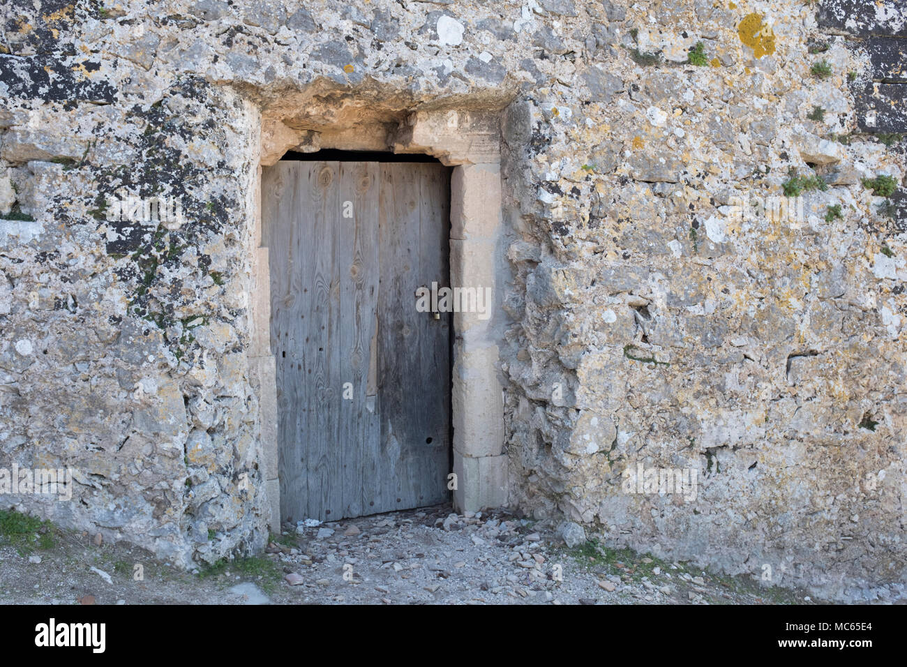 Rustic door and old stonework in and old Monastery, Pollensa, Mallorca, Spain Stock Photo