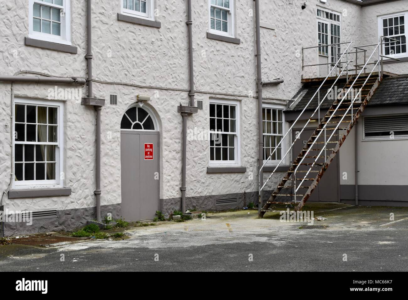 Red sign on white and grey building along New Elvet in Durham Stock Photo