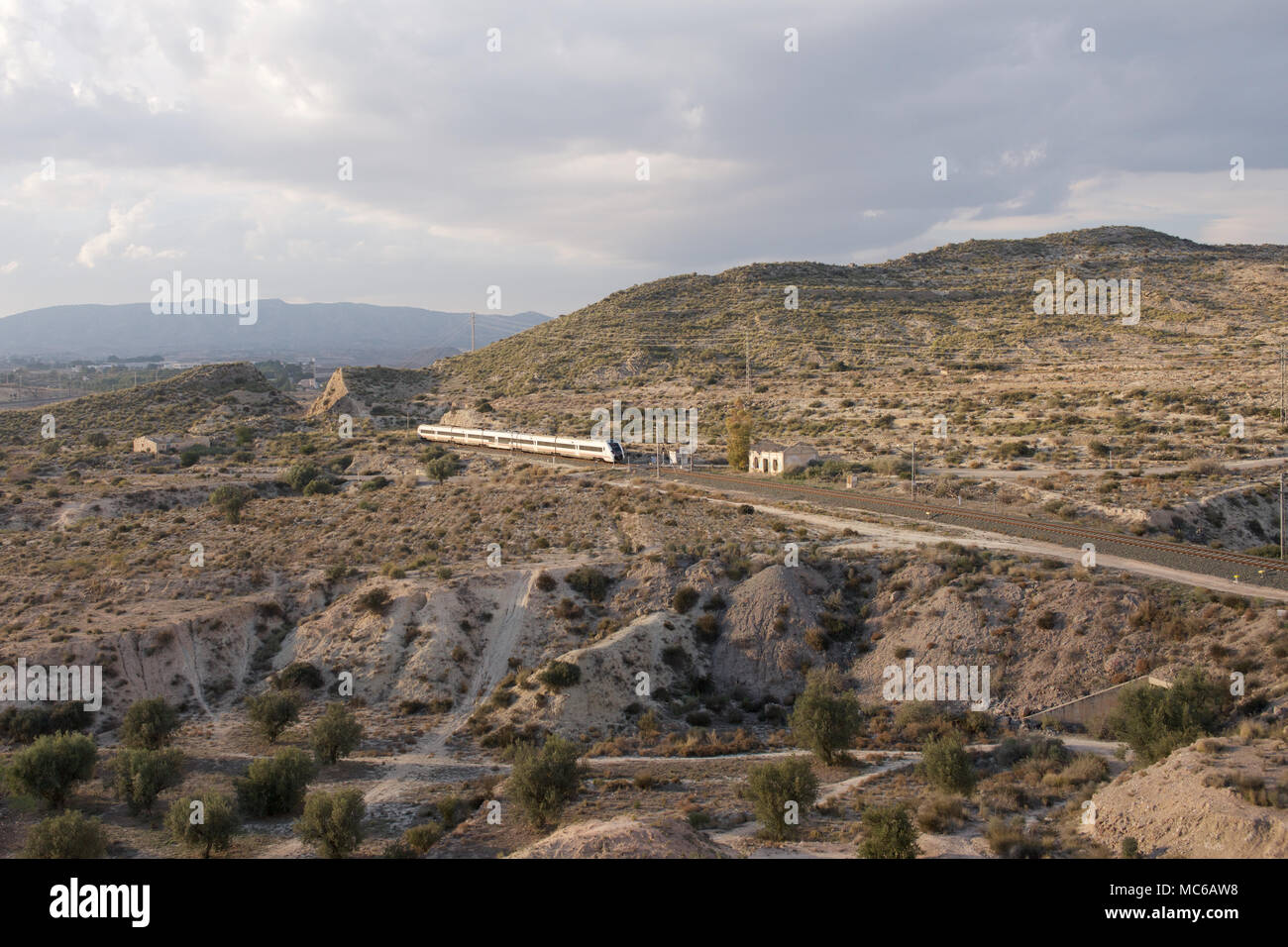 Renfe passenger train in the countryside of Spain Stock Photo - Alamy