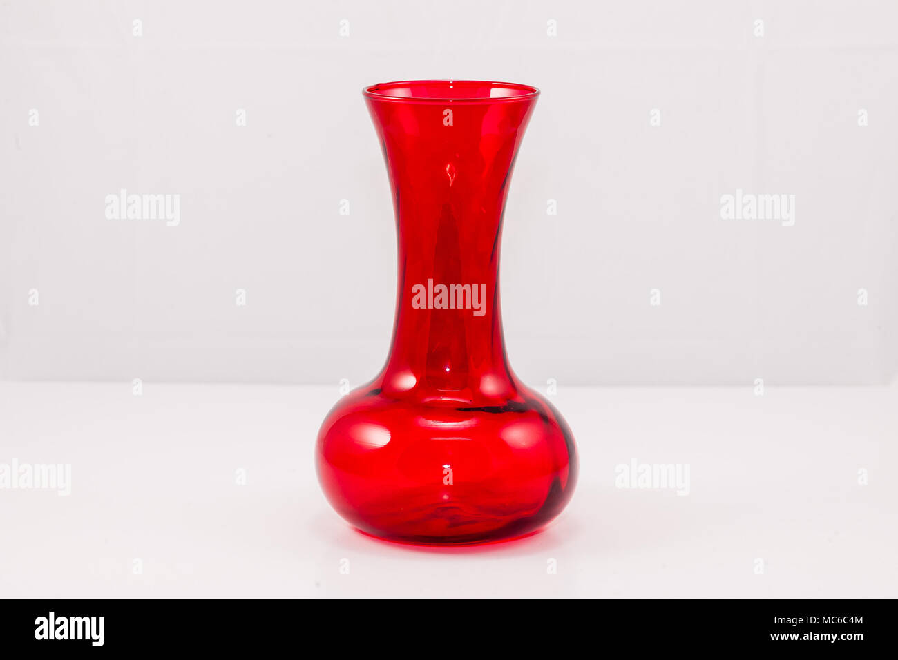 red glass flower vase Stock Photo Alamy