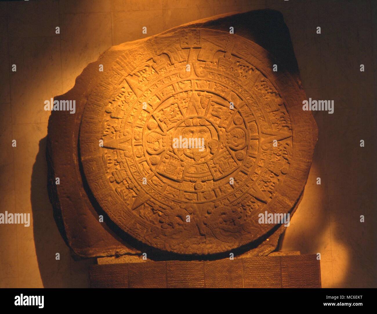 CALENDARS - Aztec Calendar stone. The Aztec Sun Stone, or Calendar, which weighs 24 tons, and is almost 12 feet in diameter. The face of Tonatiuh, the Sun God, is in the centre. In the National Anthropological Museum, Mexico City Stock Photo