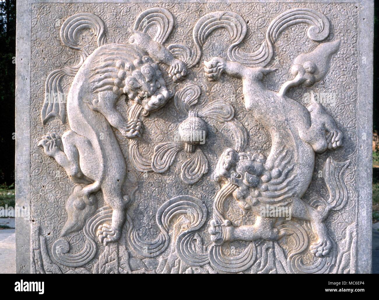 Chinese dragons. marble bas relief on the old gate to the avenue of animals at the Ming Tombs