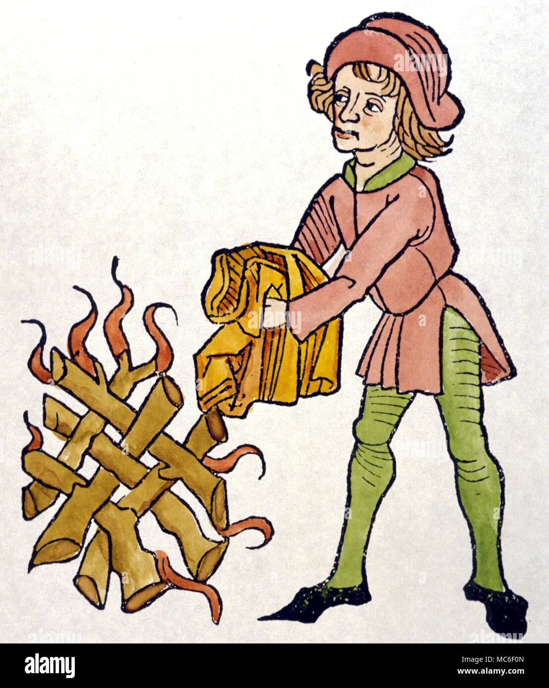 FIRE Mediaeval woodcut showing the fabric asbestos resisting the flames. From an early 16th century 'Hortus Sanitatis' Stock Photo