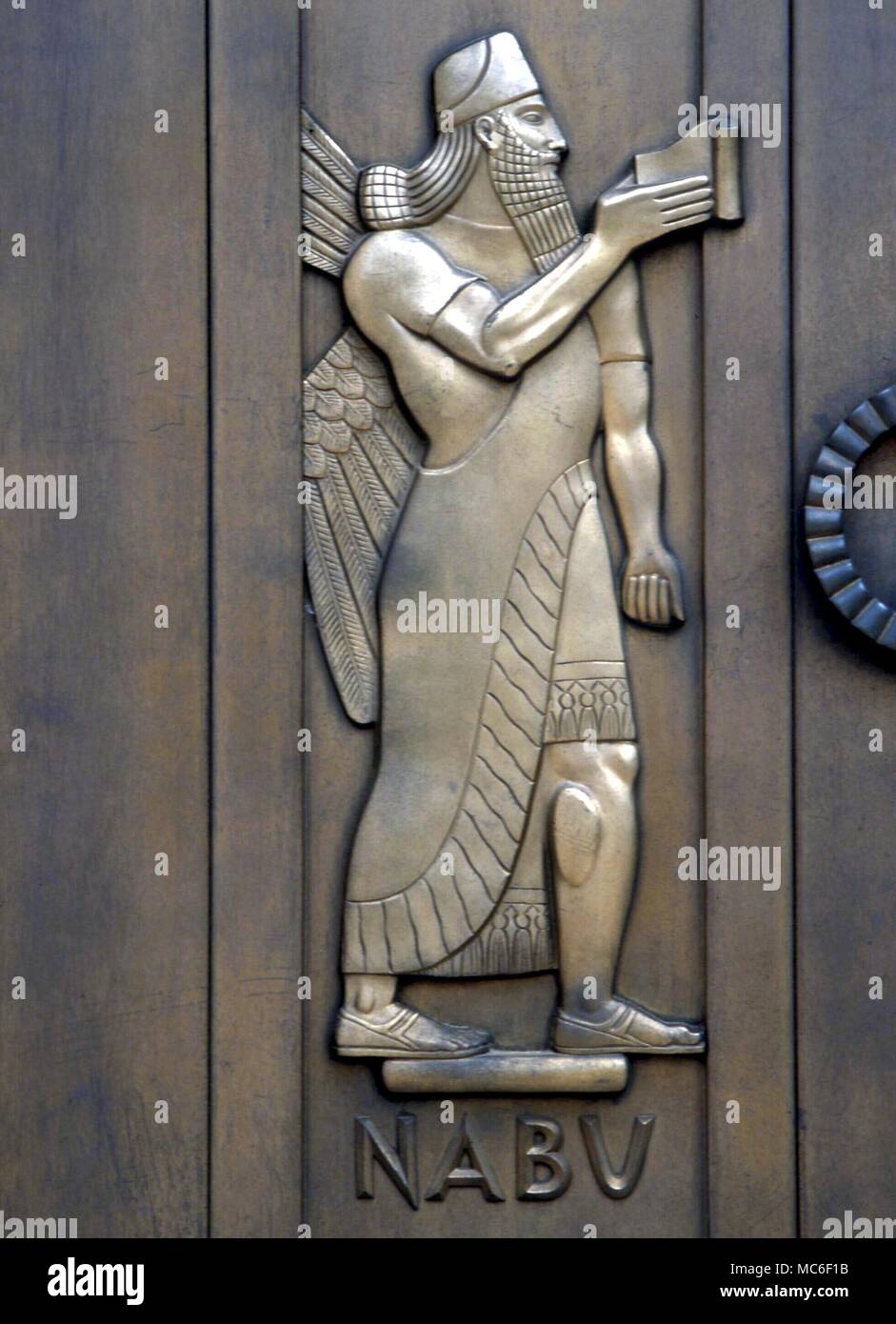BABYLONIAN MYTHOLOGY Nabu, the god of wisdom in Babylonian mythology - the equivalent of Thoth, and guardian of the Tablets of Wisdom. Doors of the annex, Library of congress, Washington DC Stock Photo