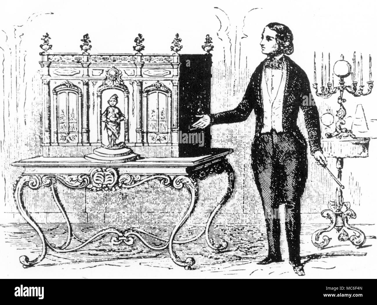 Stage Magic - Robert Houdin - The 'pastry cook'' automaton of R-H, which will fetch from the shop sweets and confections demanded by the audience.' Stock Photo