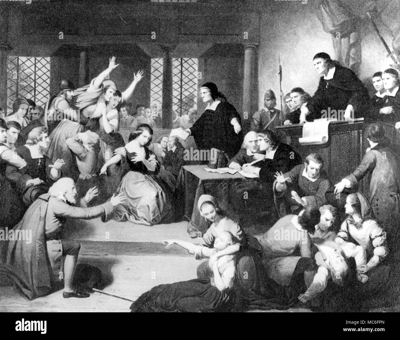 Witchcraft - One of the hearings at Salem, Massachusetts, the most notorious of all American witch trials. This lithograph, after the painting by Matteson, in th4e Essex Institute, Salem, shows the trial of George Jacobs, who was hanged on 19th August 1962 on the evidence of a child. Later, the girl confessed that she had falsely ................... Stock Photo