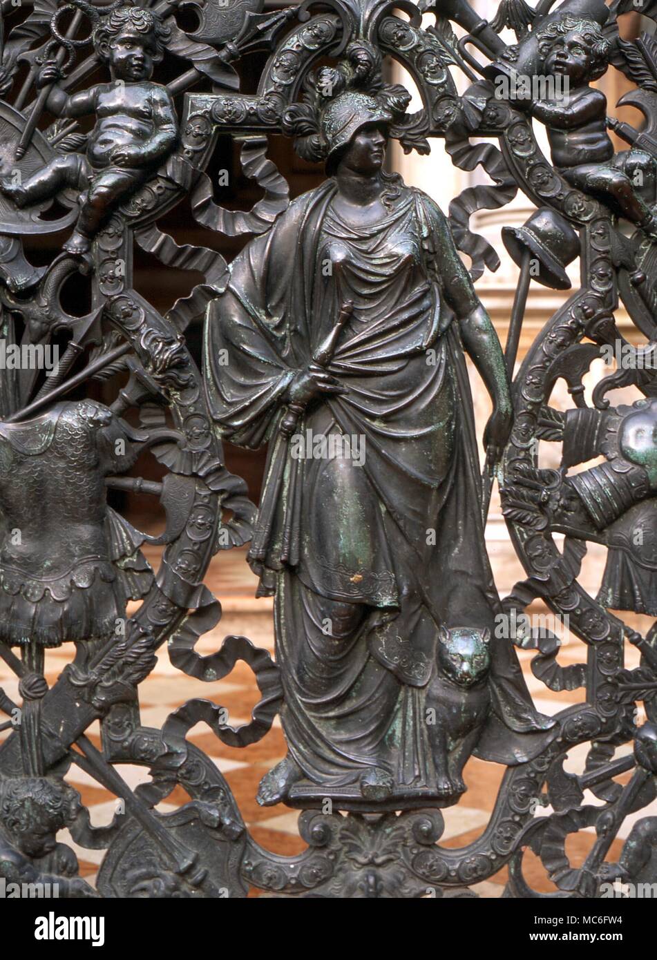 Detail of Minerva with Cat, an ornate metalwork gate of loggia of the Campanile of St Marks, Venice, Italy Stock Photo