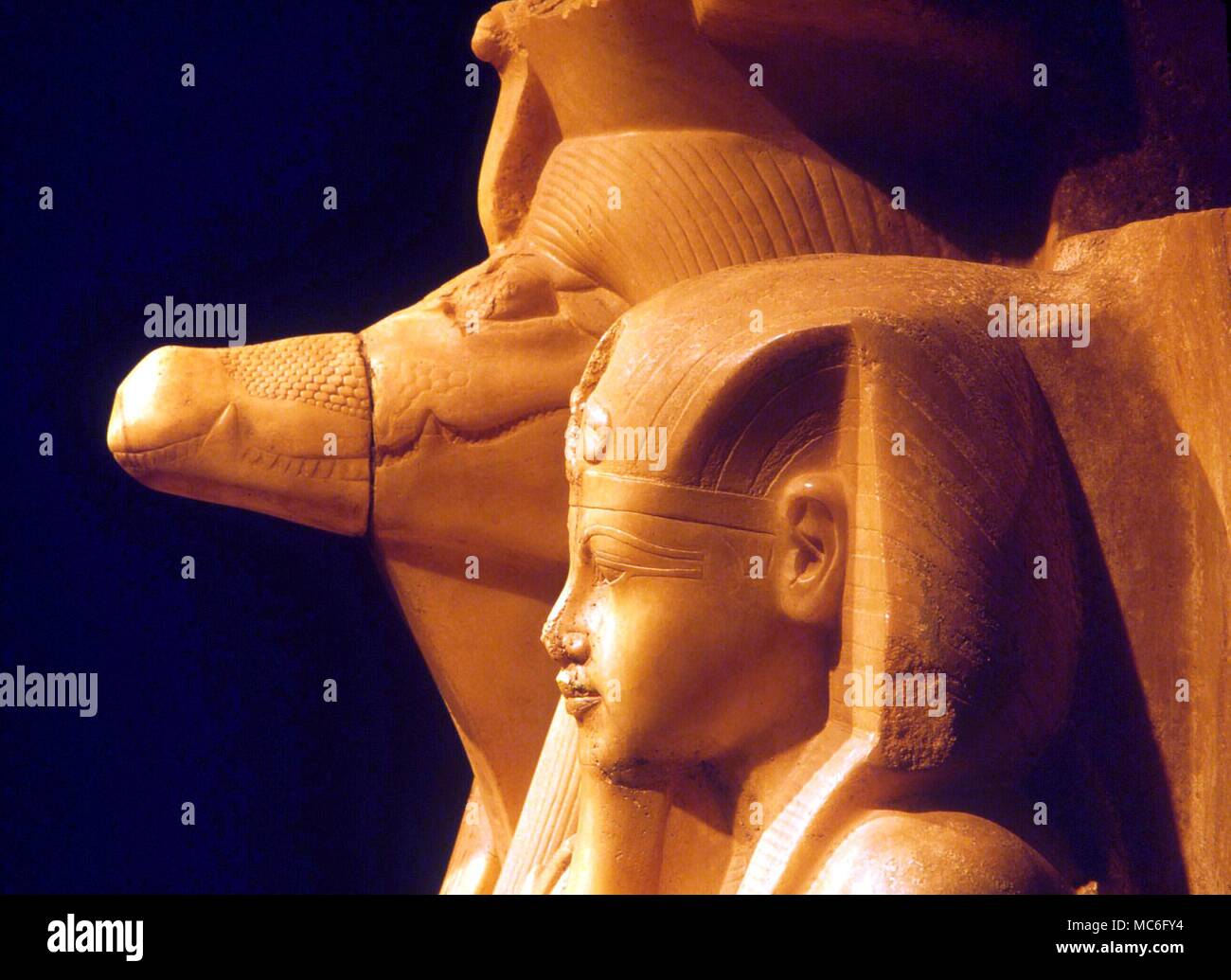 The crocodile-god Sebek with a youthful Pharoah. Sculptural group of the Middle Kingdom in Luxor Museum, Egypt. Stock Photo