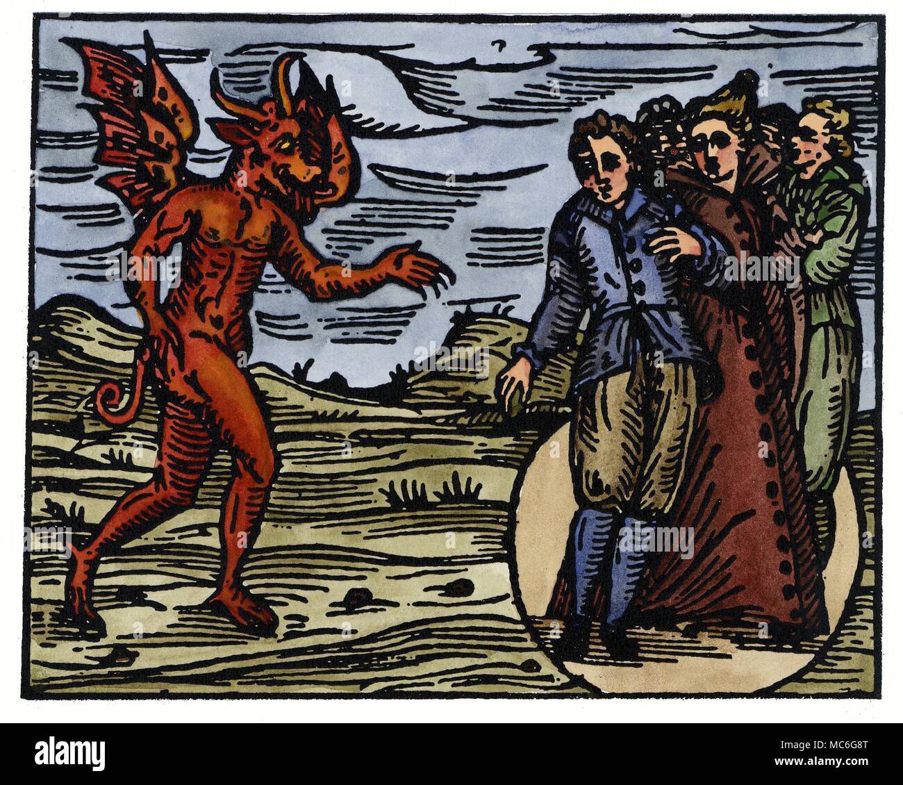 WITCHCRAFT - DEMONS Witches swearing allegiance to the Devil, whilst standing in a circle marked out in the earth. Hand-coloured print from Francesco Maria Guazzo, Compendium Maleficarum, 1608. This was the most learned and precise of mediaeval witchcraft manuals, and in some respects (because it paid homage to the superstitions of the worst kind) one of the most horrible. Stock Photo