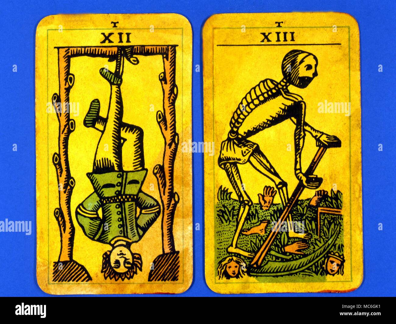 Tarot Cards-Majo Arcana- The Parisian Tarot. Card 10. The Wheel of Fortune, and Card 11. The Strength. Two cards from a Major Arcana picture Tarot,adapted by a Wiccan group. Probably designed in an archaizing style in loose imitation of the Rosicrucian deck designed by Pamela Coleman Smith, alongside A.E.Waite, and various earlier decks, such as that published by Encausse (Papus) in The Tarot of the Bohemians at the end of the 19th century, post 1905, but earlier than 1912. The name Parisian Tarot was given by the owner of the deck - it might however be called the Tau Tarot, from the intrigui Stock Photo