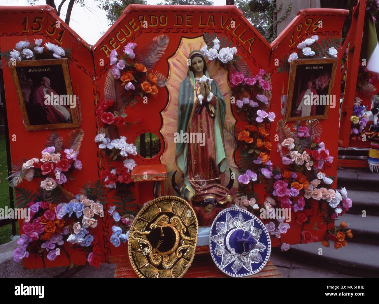 Mexico City. Popular artwork representing the Virgin of Guadalupe, who appeared to an Indian, Juan Diego, in 1531. Stock Photo