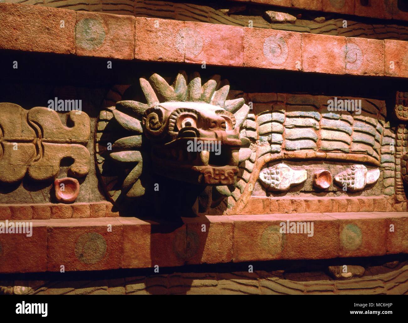 Mexican Mythology -Quetzalcoatl Life size reproduction of the first three units of the coloured facade of the Temple of Quetzalcoatl at Teotihucan. The grotesque is Tlaloc. National Anthropological Museum. Mexico City. Stock Photo