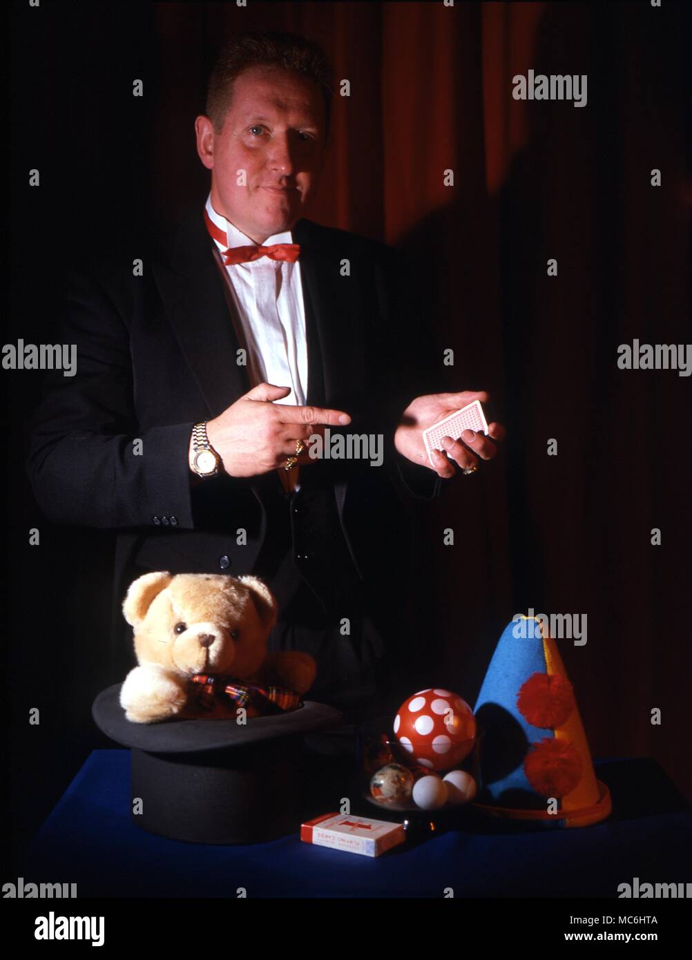 Stage Magic - The magician introducing himself at the beginning of a show. Stock Photo