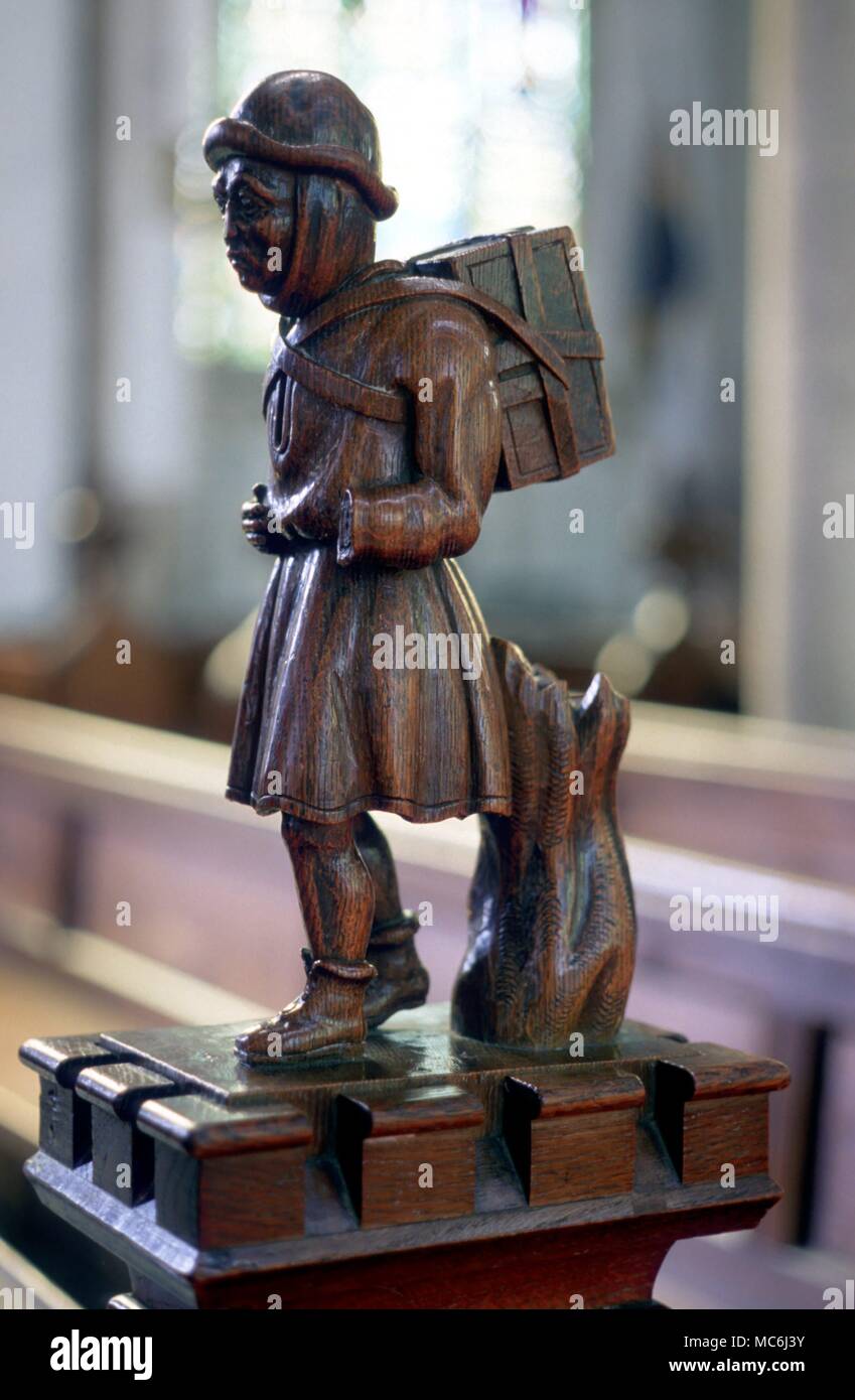 British Myths Pedlar of Swaffham Finial of pedlar (the dog forms an adjacent finial) in the church of SS Peter and Paul at Swaffham The pedlar provided the money to rebuilt the church Stock Photo