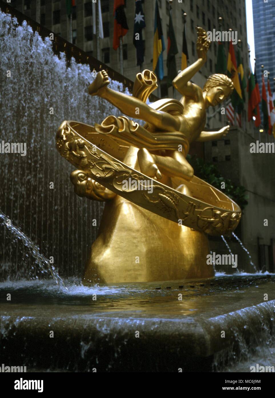 ASTROLOGY. Bronze sculpture of statue of Prometheus by Paul Manship, in Lowser Plaza of the Rockefeller Building, New York. Zodiacal signs and sigils are picked out in relief Stock Photo