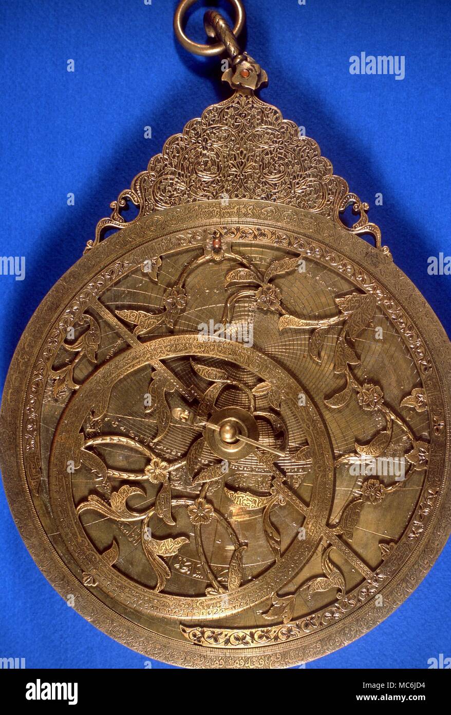 ASTROLABES. A fourteenth century Arabic astrolabe - a brass, portable instrument for determining stellar, zodiacal and planetary positions; for telling the time, and for locating the position of Mecca. From the Dar al Athar al Islamiyyah, Kuwait Stock Photo