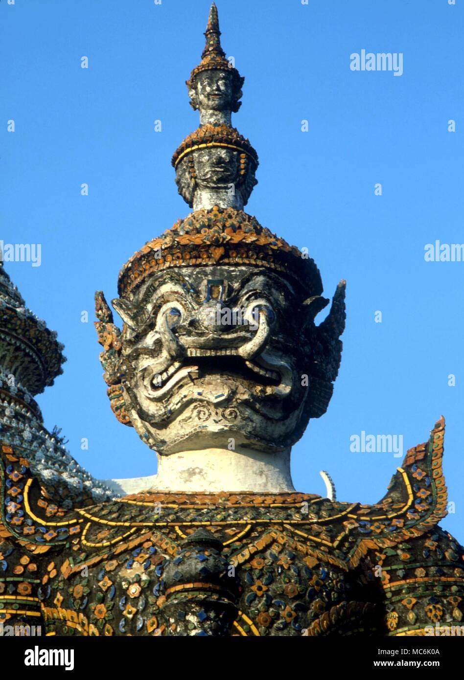 DEMONS - Temple guardian of gigantic size, in front of the main doorway of the Grand Palace Temple, Bangkok, Thailand Stock Photo