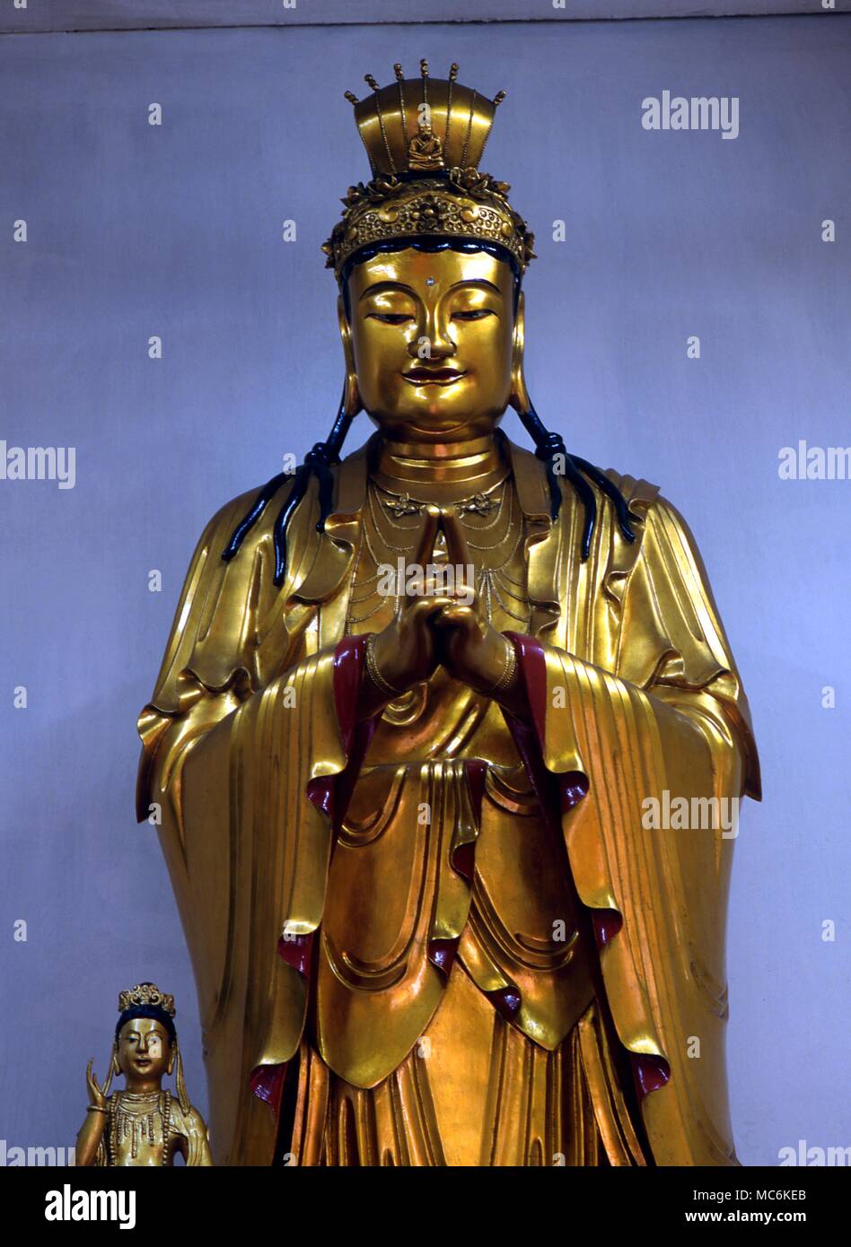 Buddhism Standing Buddha in one of the upper temples of the Temple of the Thousand Buddhas Sha Tin Stock Photo