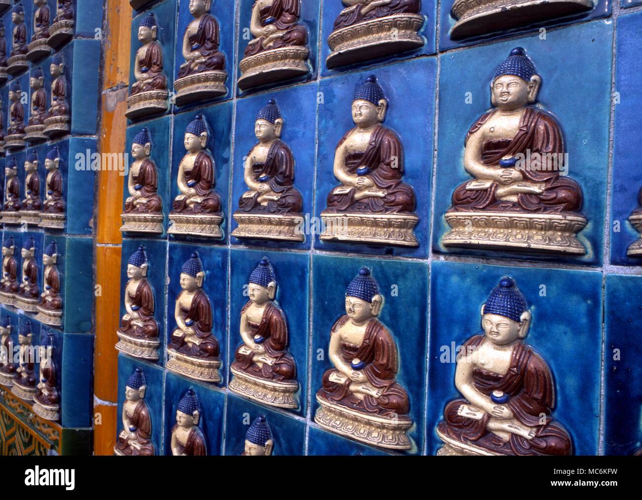 Buddhism Buddhist statues ceramics on the exterior wall of the temple