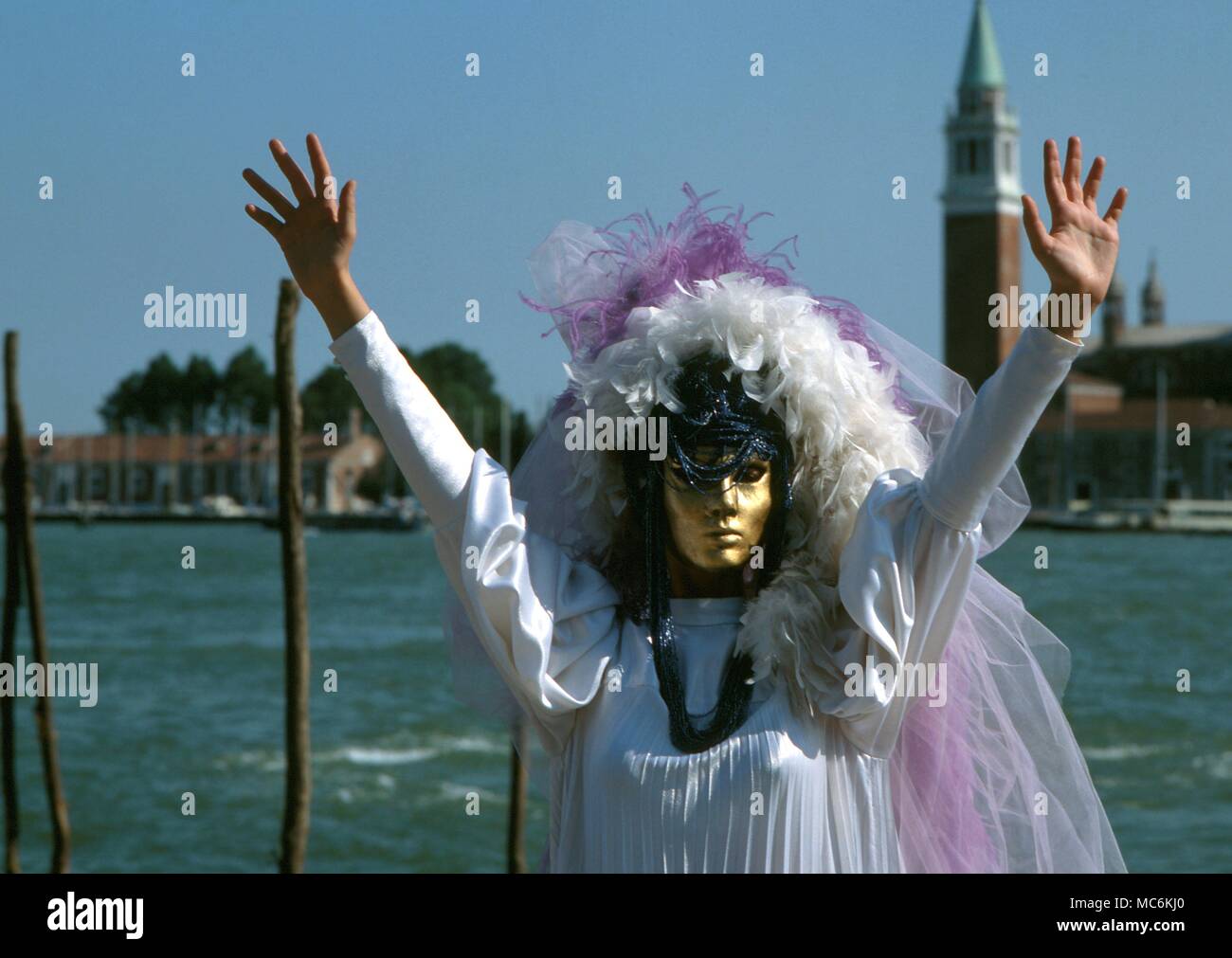 Venice Carnivale. Mask and eighteenth century carnivale costume in Venice. Stock Photo