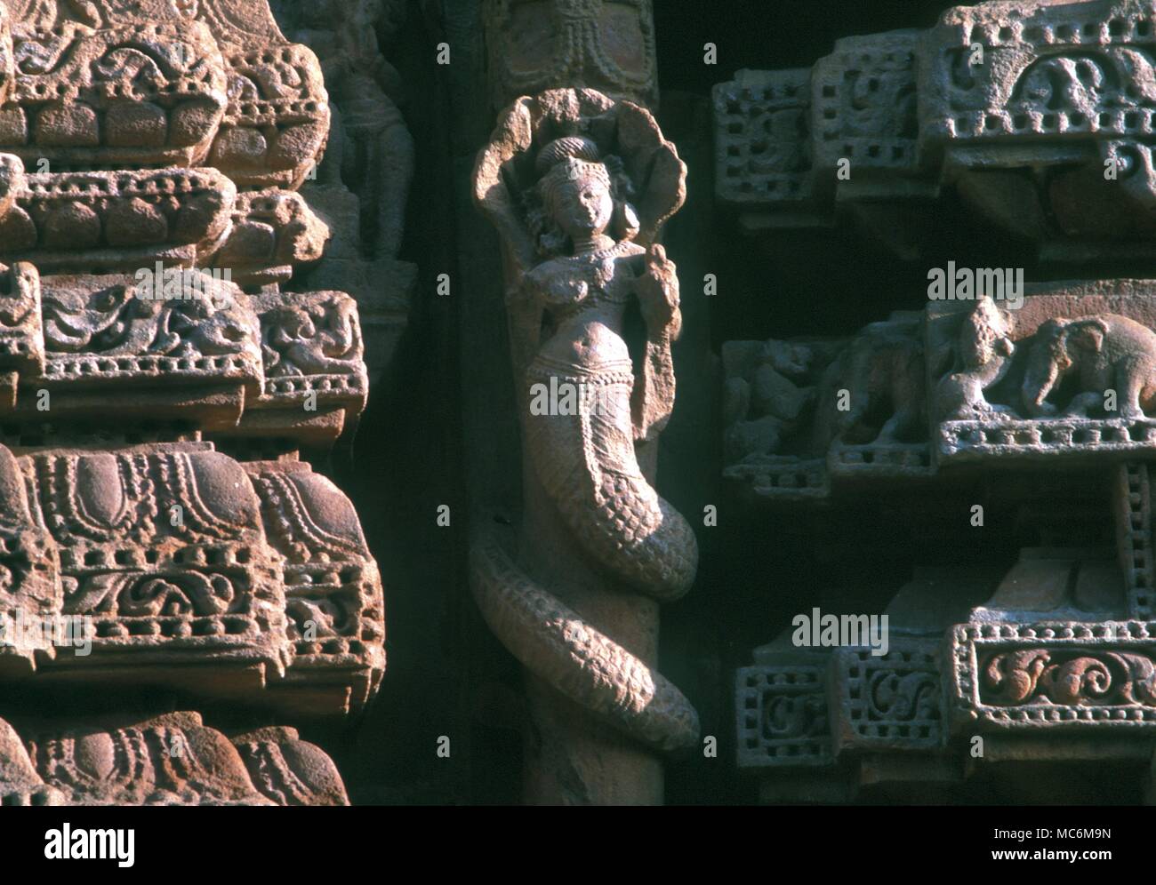 Hinduism. Figure of a naga (formerly ones of the Asuras) on a temple at Bhubanesvar, India. Stock Photo
