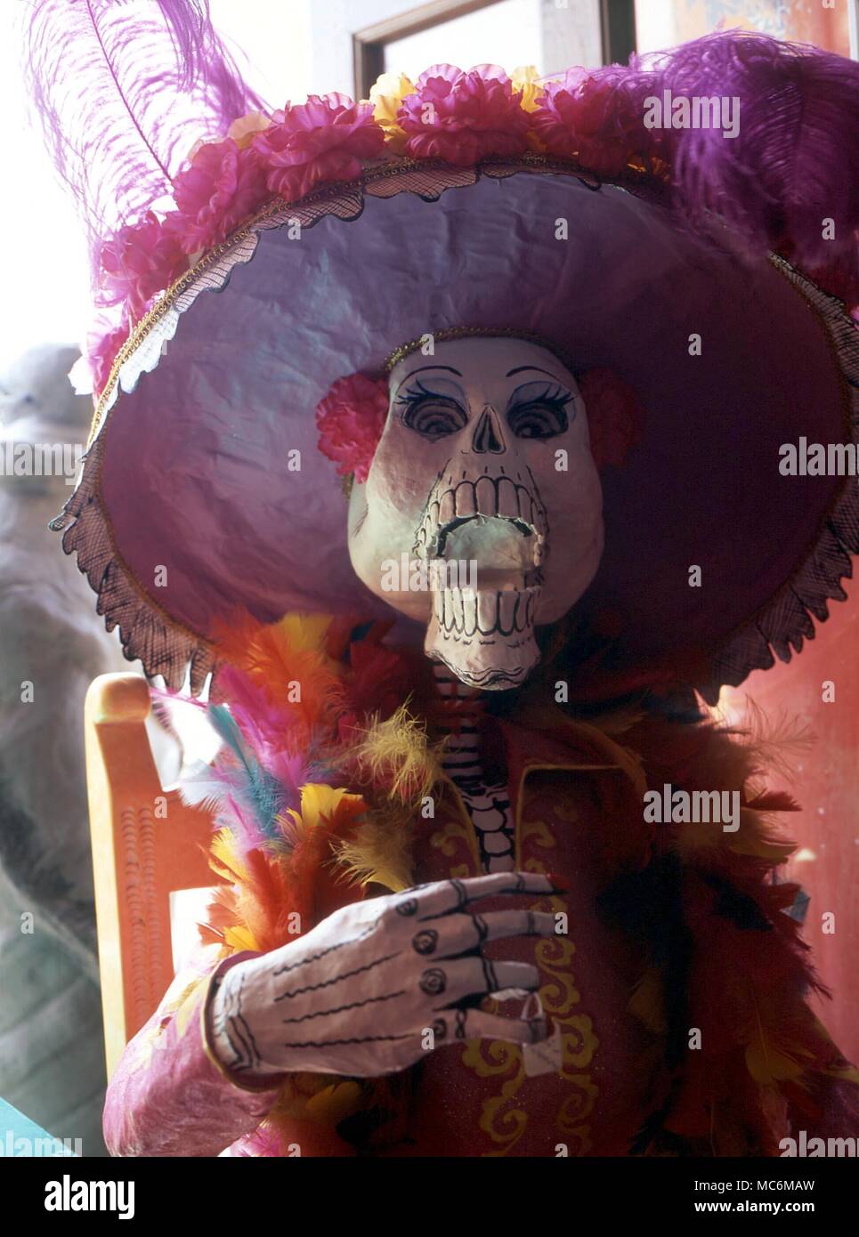 DEATH - DEATH - FESTIVAL OF THE DEAD. The Mexican Fiesta de Muertos, beginning 1st November, involves a long preparation of crude (and even artistic) images of Death in the form of skeletons. Examples from Oaxaca Stock Photo