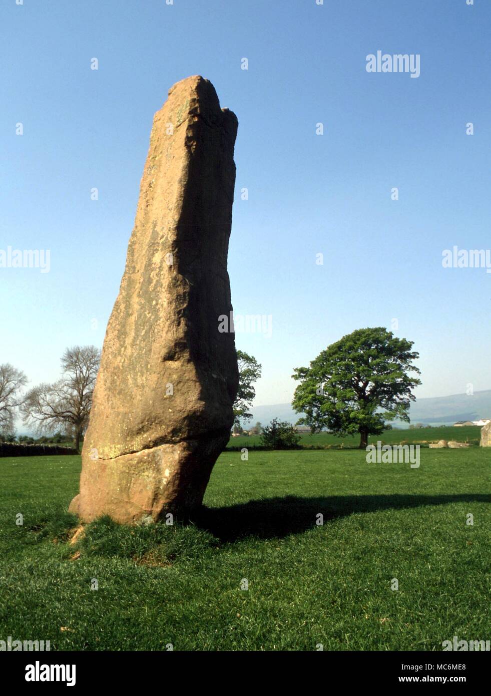 Stones - The stone circle known as Long Meg and her Daughters, in Cumbria. The main upright, shown here, is Long Meg herself. Constructed circa 2,500 BC Stock Photo