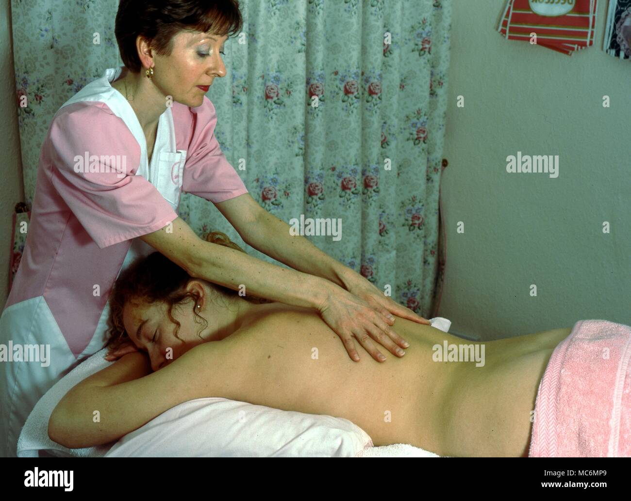 A spinal massage according to the treatment advocated by Decleor of Paris. Stock Photo