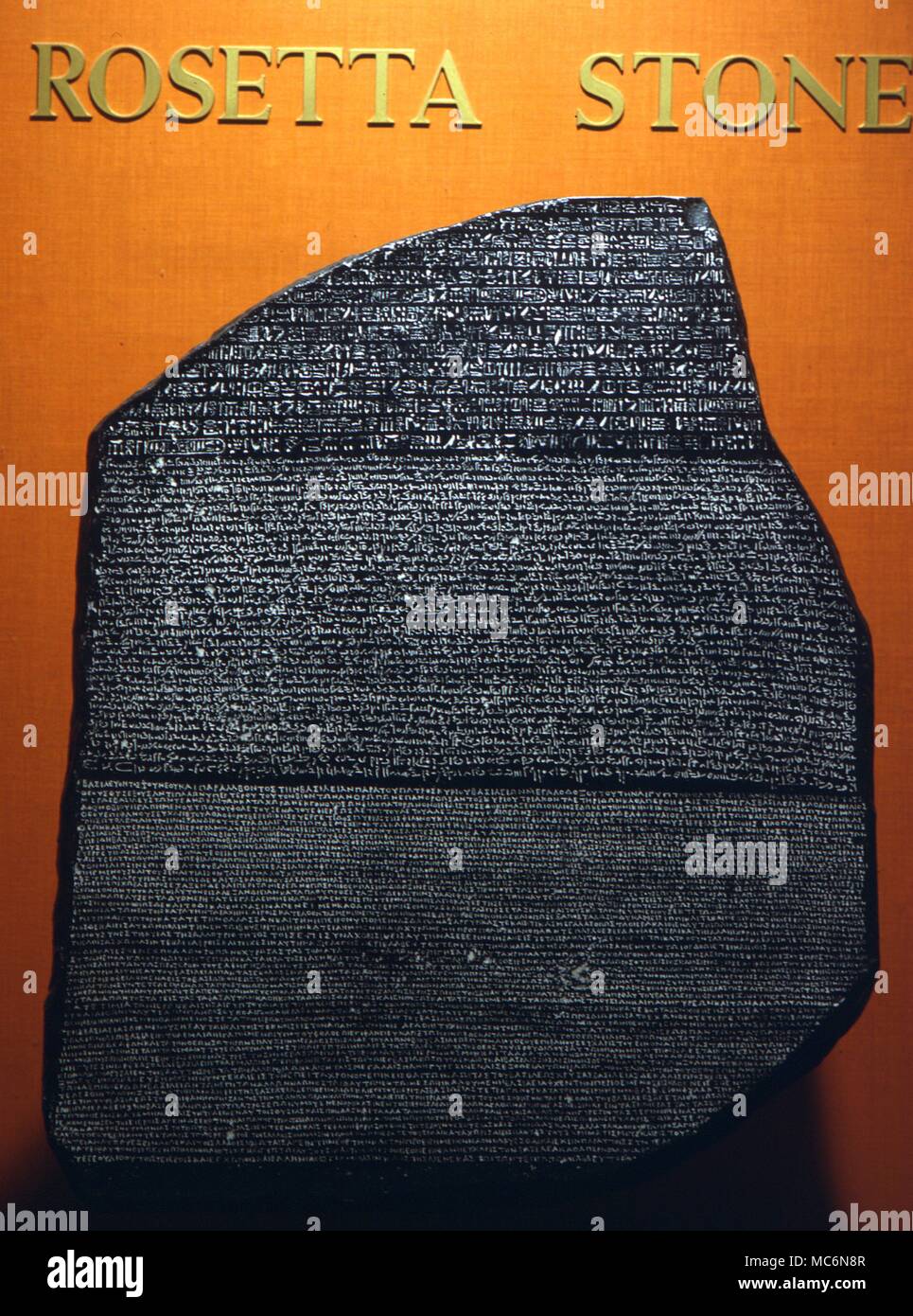 Egypt Rosetta Stone Exact facsimile of the Rosetta Stone by which Champollion was enabled to learn to read the Egyptian hieroglyphics in the Egyptian Museum San Jose California Stock Photo