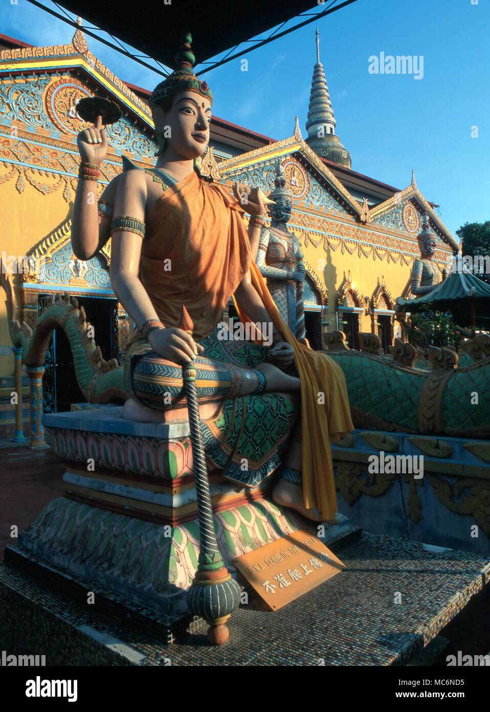 Malaysia Penang Buddhist deity outside the facade of the Wat Chayamanghkalaram Temple Stock Photo