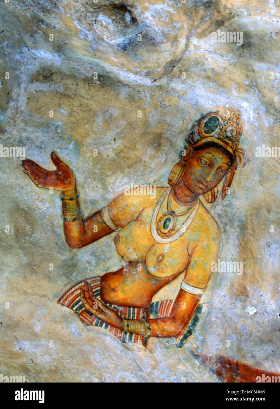 Fresco, painted on rock face of the Lion Rock at Sigriya. The subject is a so-called 'Cloud Maiden'. Painted in the fifth or sixth century AD. Stock Photo