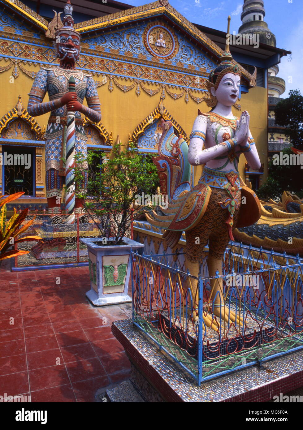 The garudas guard the facade of the Wat Chayamanghkalaram temple. Stock Photo