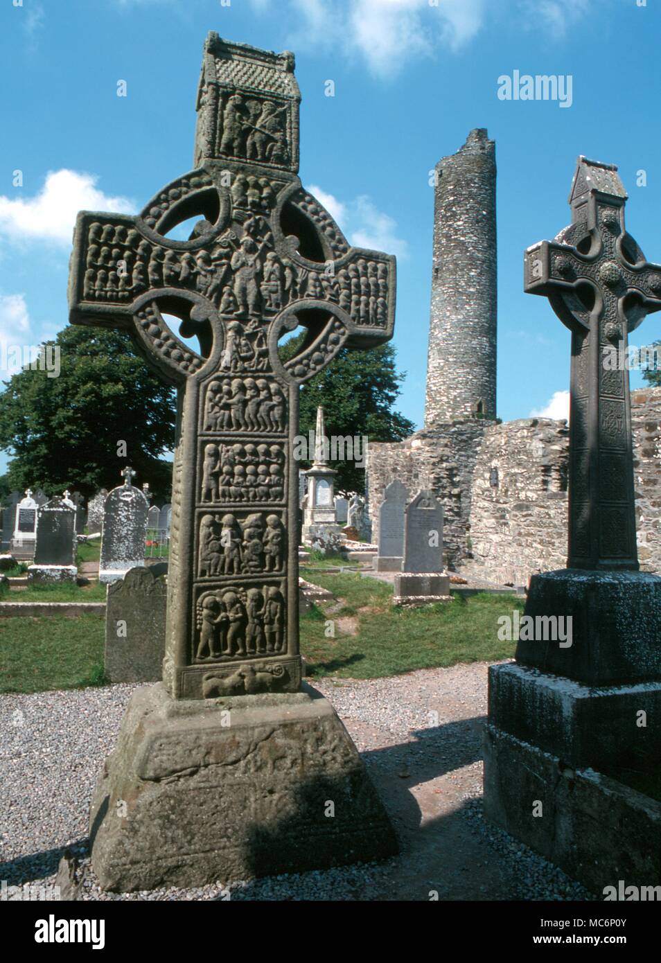 Celtic Crosses - Monasterboice - The 10th century South Cross at Monasterboice, with The Last Judgement in the central boss of the cross. Christ holds the cross and the flowering rod. The cross is 18 feet high: sometimes called Muiredach's Cross.- Â® / Charles Walker Stock Photo