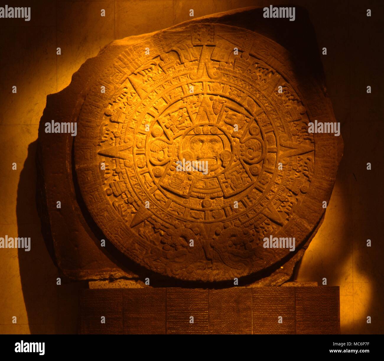 The stone is about 12 feet in diameter abd weighs just over 24 tons. The face of Tonatiuh, the Sun God, is in the centre. In the collection of the National Anthropoloical Museum, Mexico City. Stock Photo