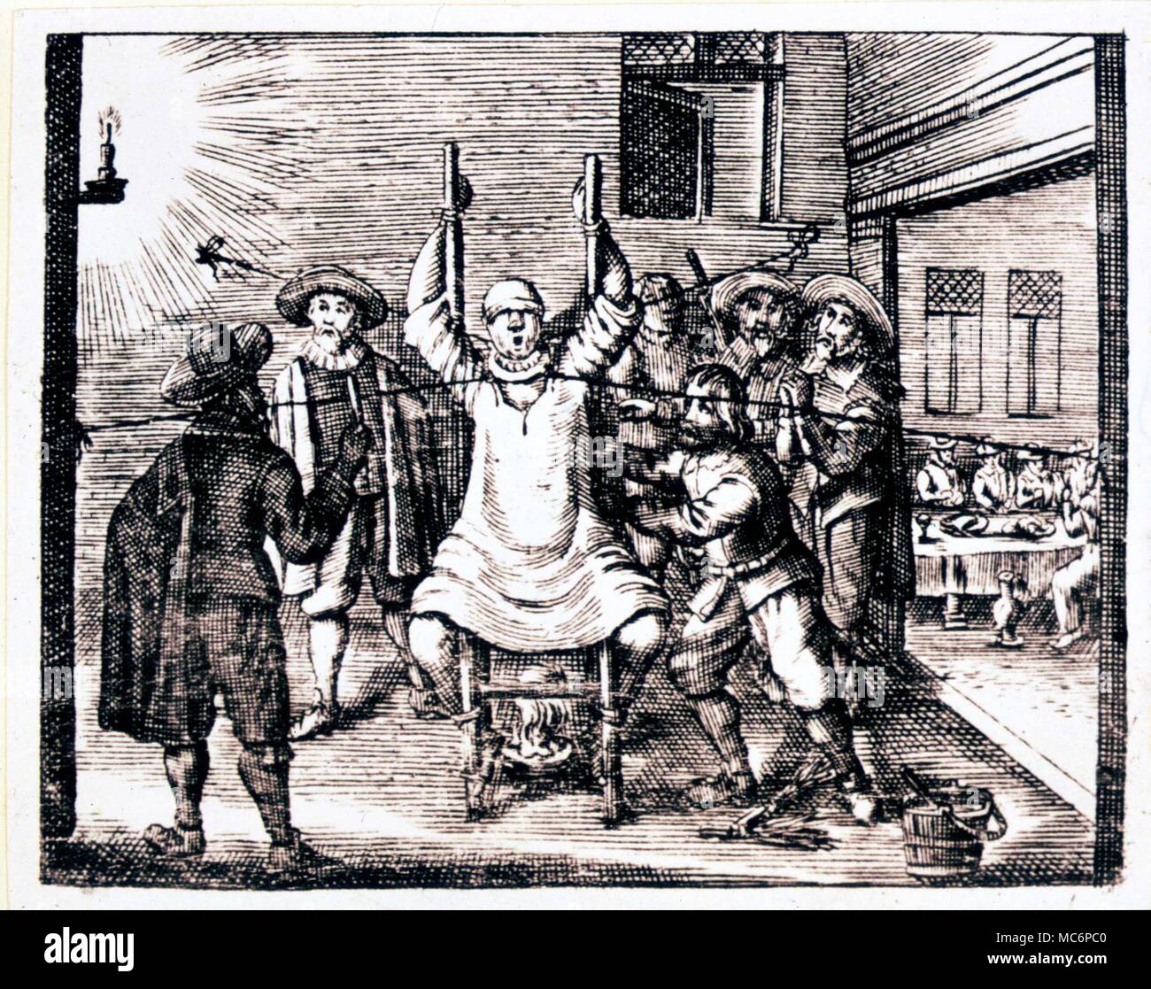 Engraving showing the torture of Herr Lutzen of Rheinbach, suspected as a witch [1631]. Stock Photo