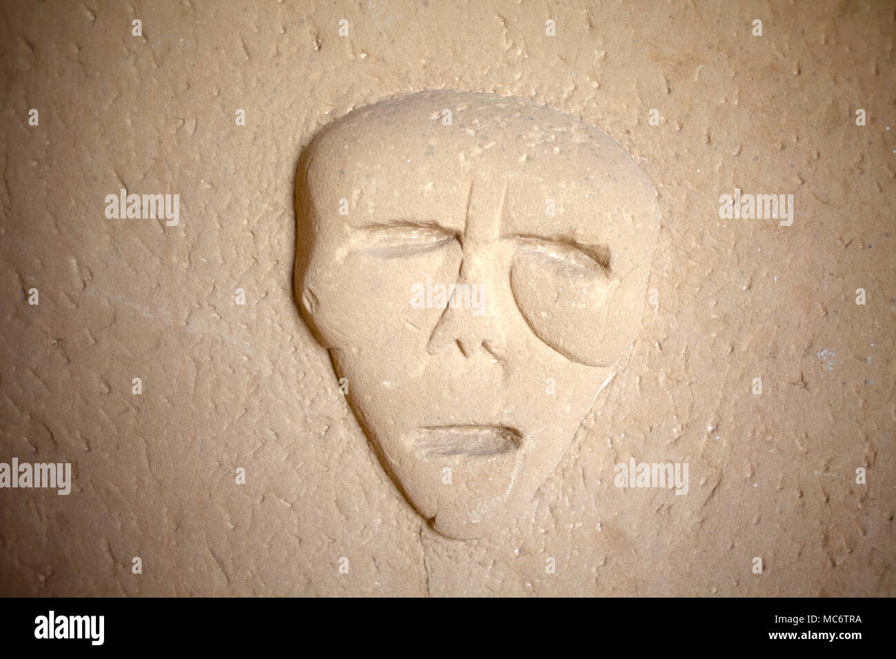 A Portuguese carving of a face of a dead person found in a collective tomb, from the XVI century, is displayed in Kashbah Museum in Tangier, Morocco,  Stock Photo