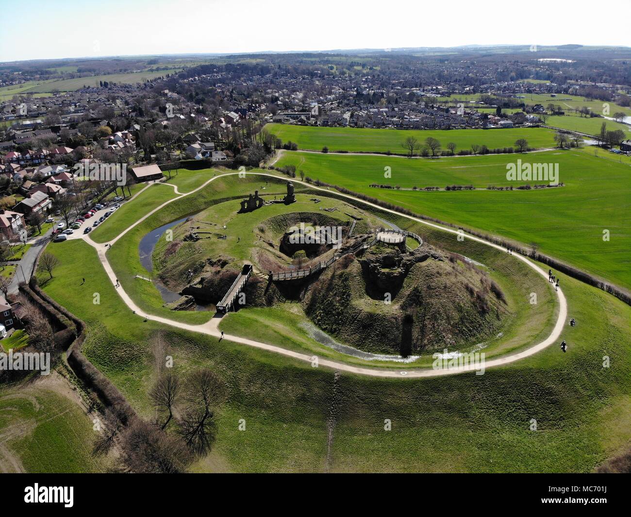 Aerial photos of Sandel Castle in Wakefield in the UK, the ruins of the castle have a moat around the castle grounds, it's also covered in green grass Stock Photo