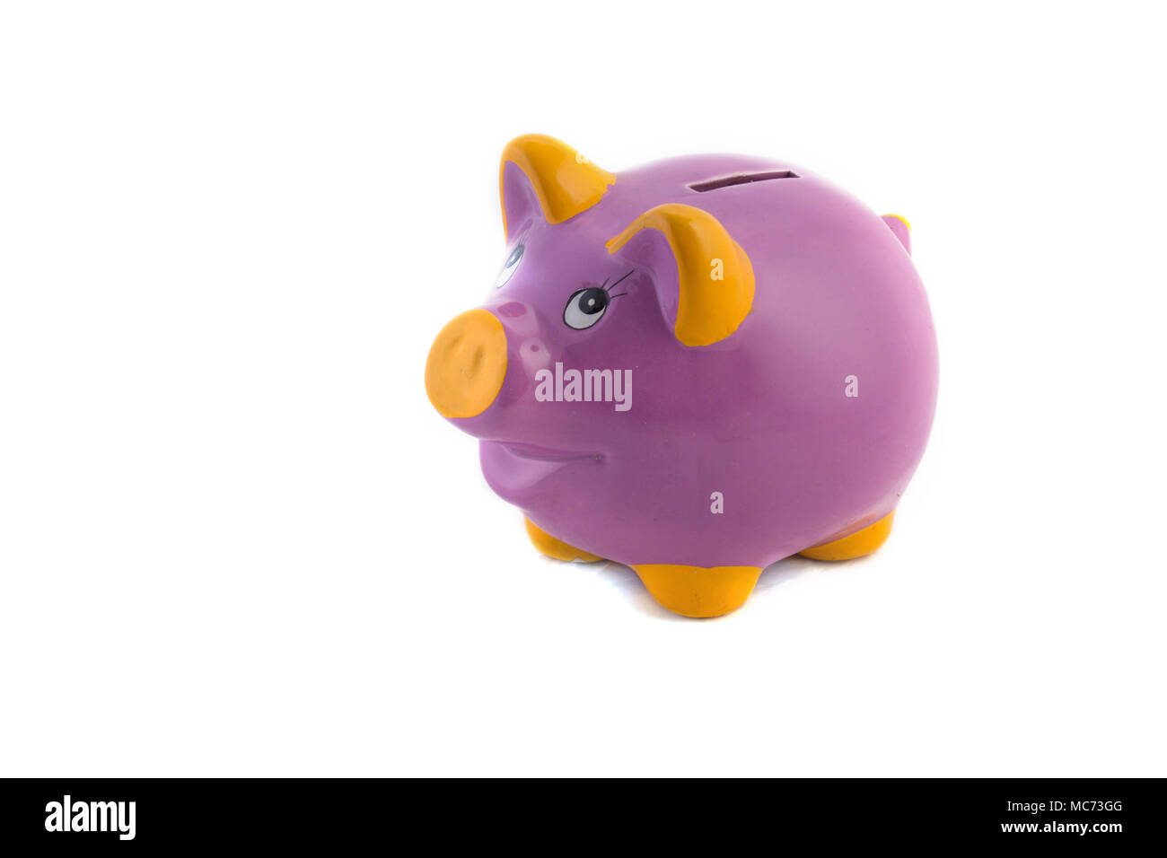Purple piggy bank on white background Stock Photo - Alamy