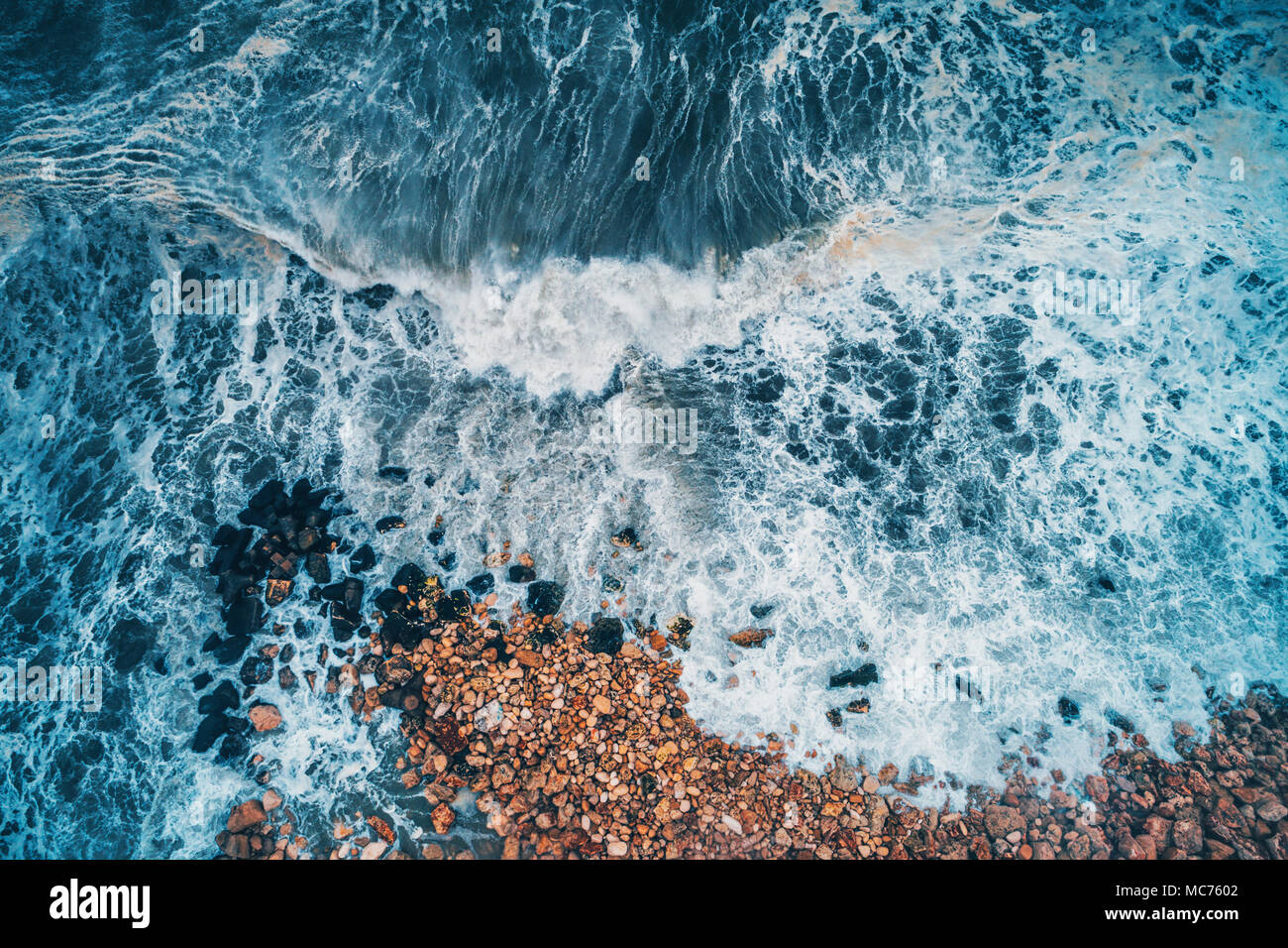 Aerial view of sea waves and rocky coast Stock Photo - Alamy