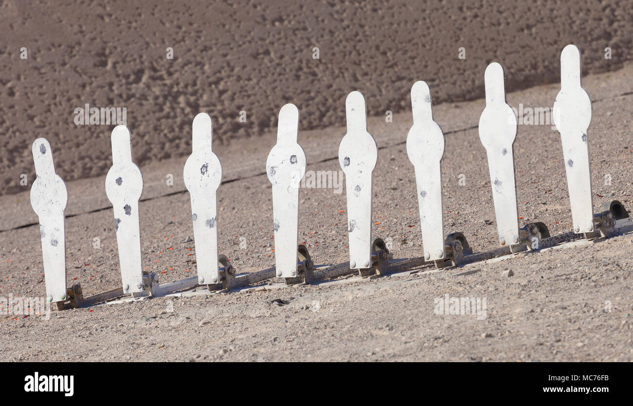 White steel silhouette targets used for handgun competition Stock Photo