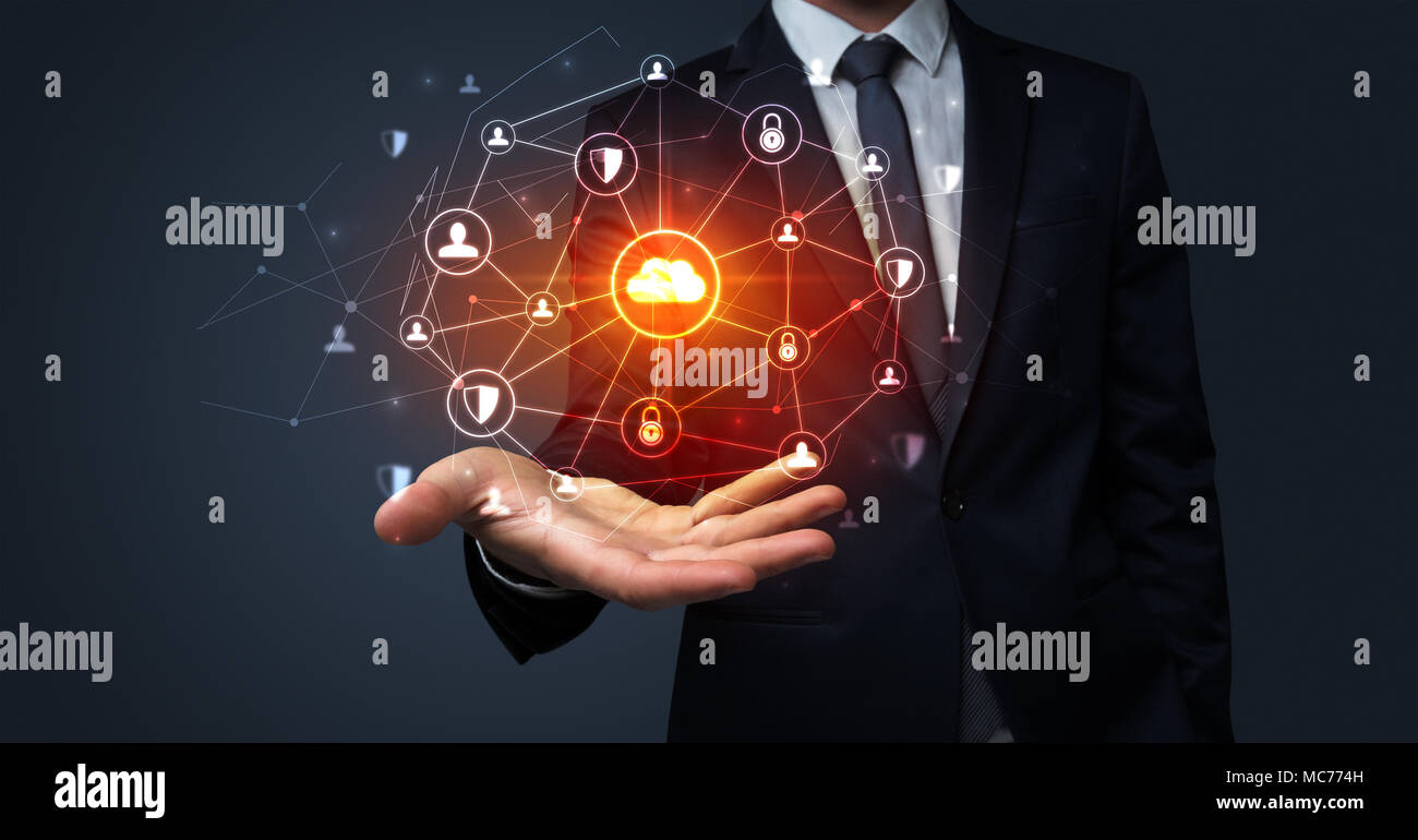 Businessman holding networking connection concept with dark wallpaper ...