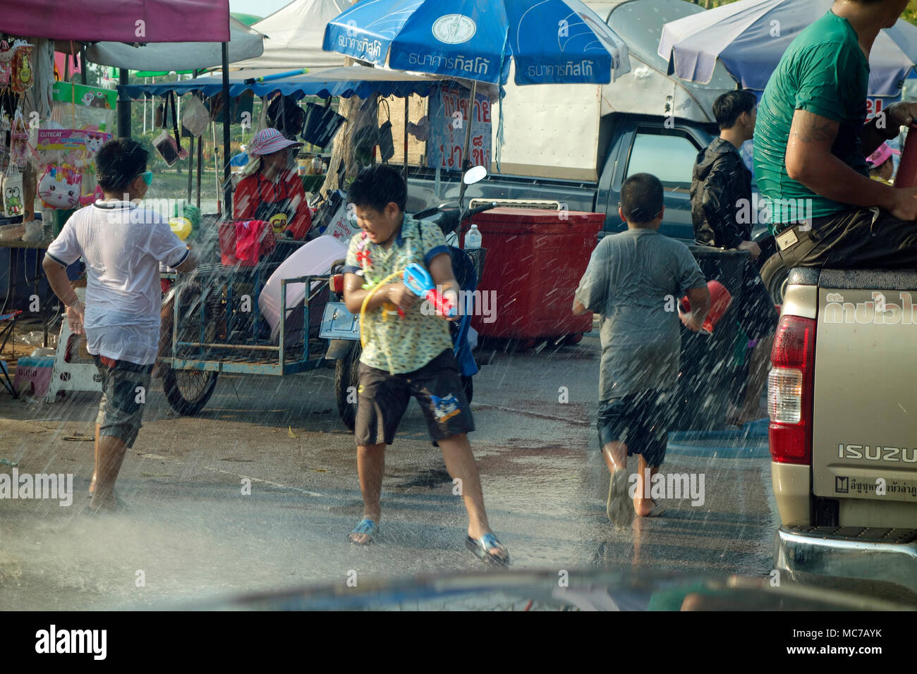 Songkran 2018 Thai New Year, children enjoying water fight in Posri Road, Udon Thani, Isaan,Thailand Stock Photo