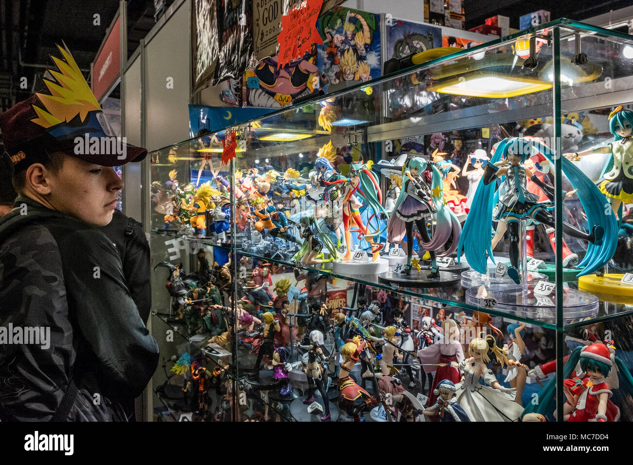 Barcelona, Spain. 13th Apr, 2018. A young visitor is seen while observing a display cabinet with reproductions of comic characters. The 36th Barcelona International Comic Fair from 12th-15th April 2018 in Fira Barcelona Montjuïc. Credit: SOPA Images Limited/Alamy Live News Stock Photo